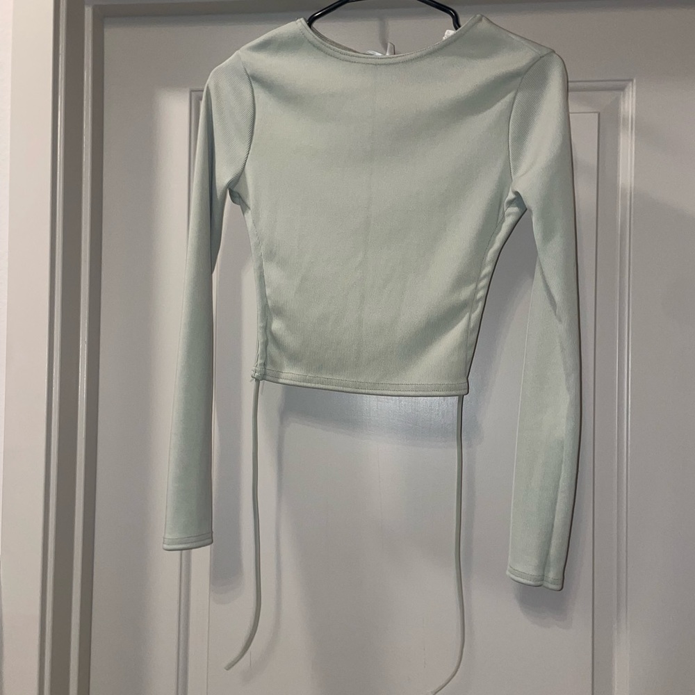 Green Long sleeve open back crop top from missguided. Brand new with tags. S